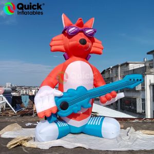 Inflatable Fox Holding Guitar